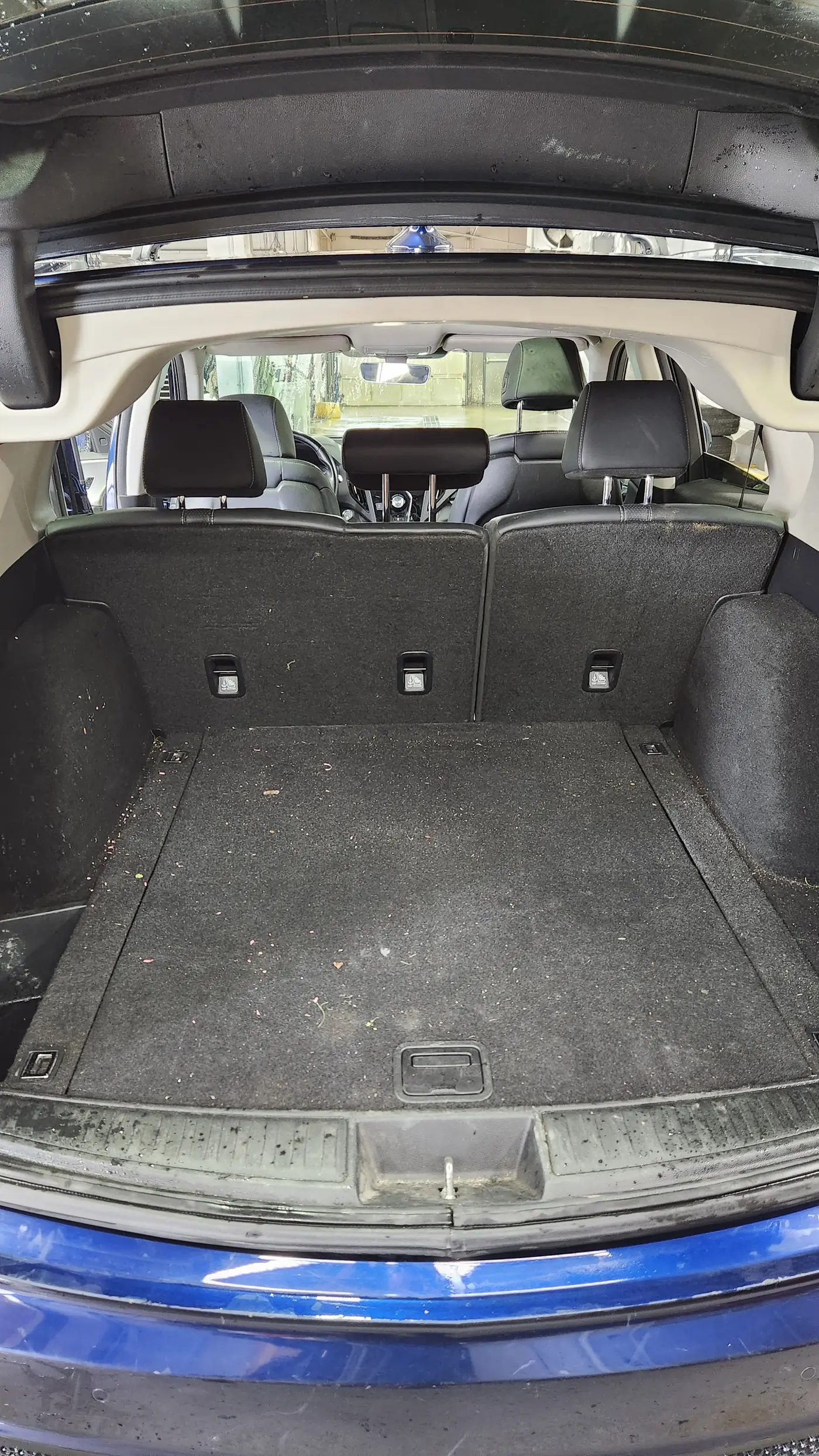 Acura MDX trunk before cleaning