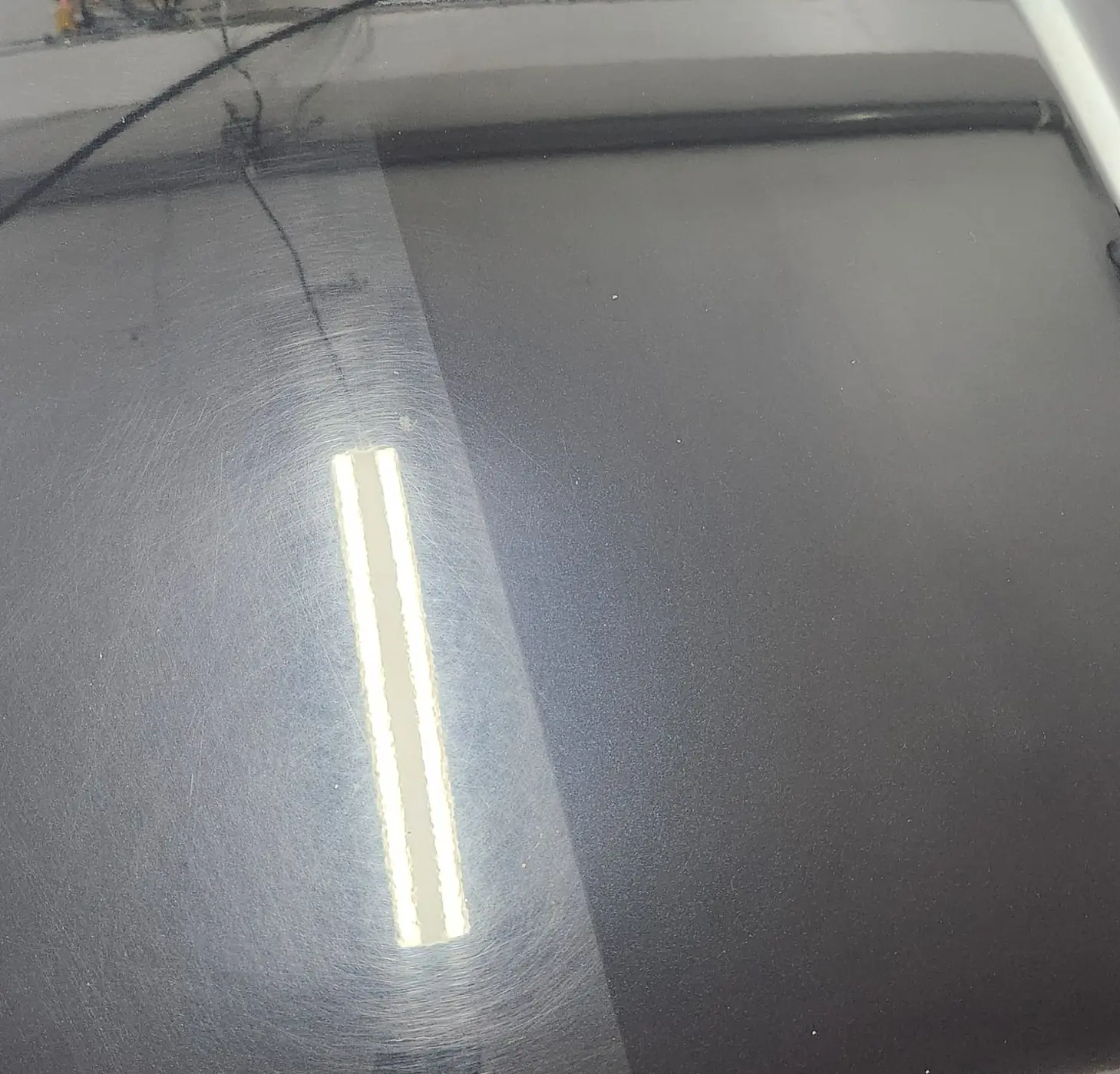 Paint correction results on black car Montreal detailing